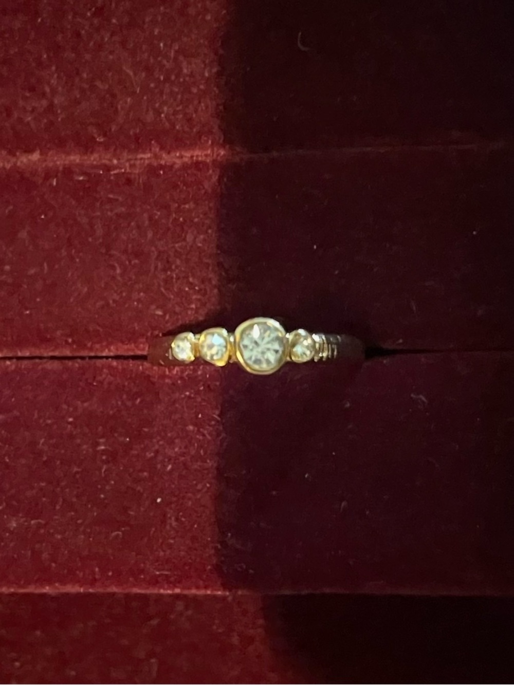 Gold Bezel–Set Four Stone Ring
